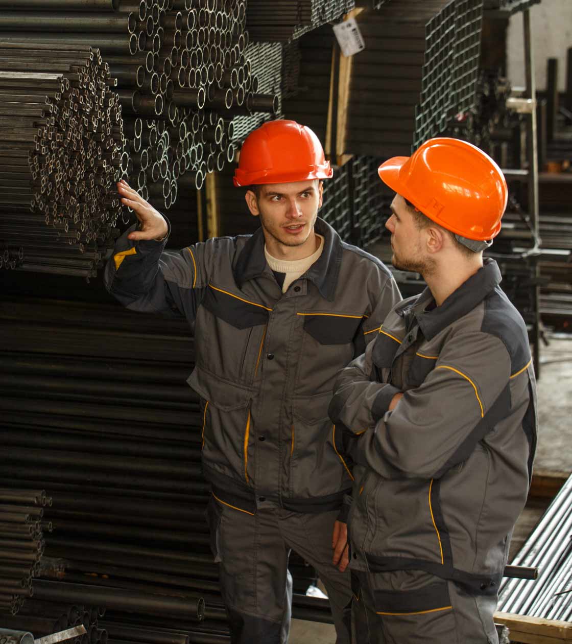 two technicians collaborating to improve production in the steel industry