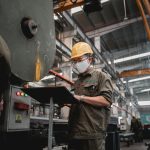 Engineer working in a steel industry manufacturing company doing technical support job